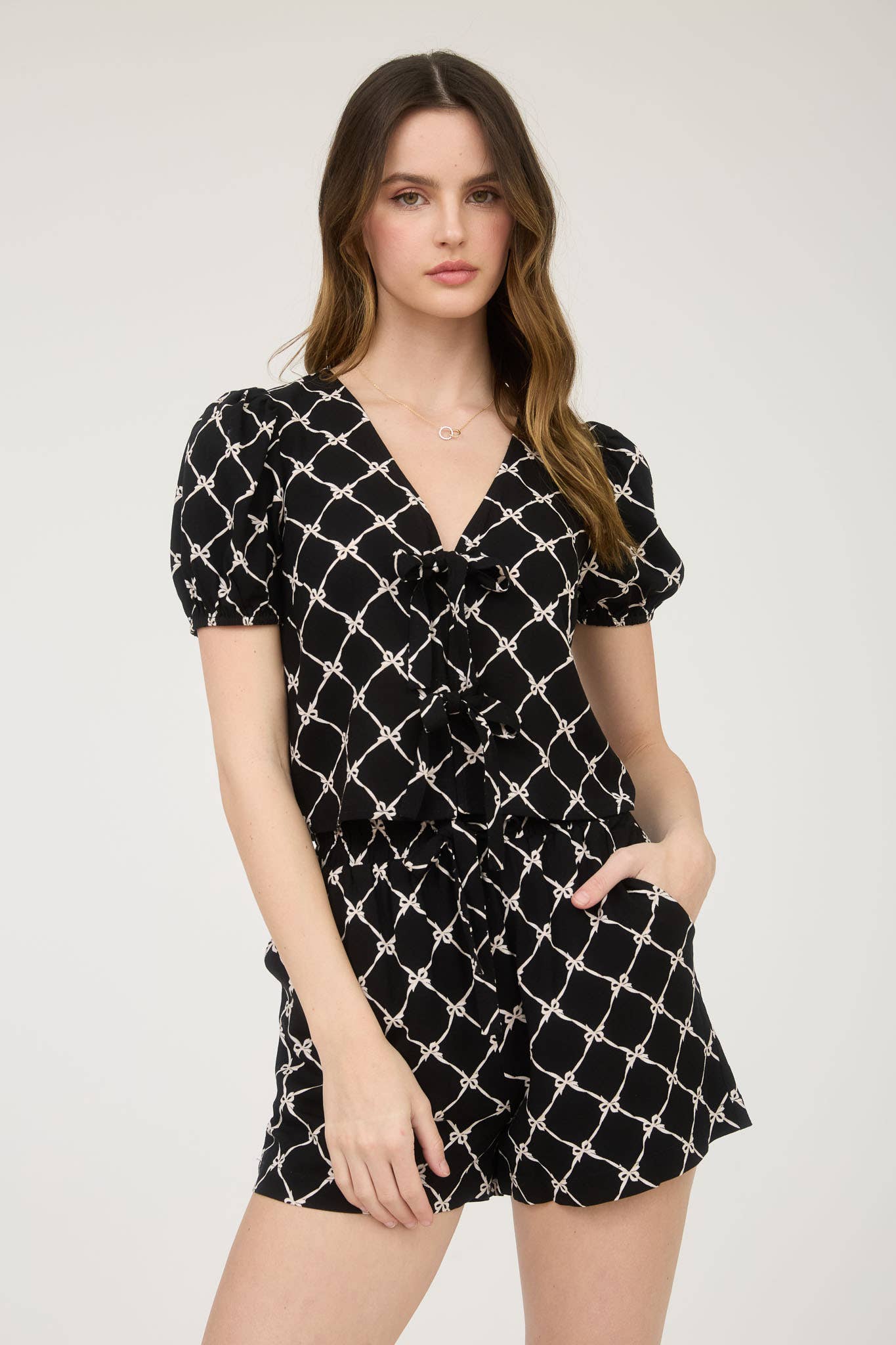 BOW PATTERN FRONT TIE PUFF SLEEVE LINEN BLOUSE