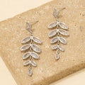 Faceted Cz Ovals Dangle Earrings