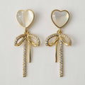 Cat's Eye Heart Bow Tassel Earrings