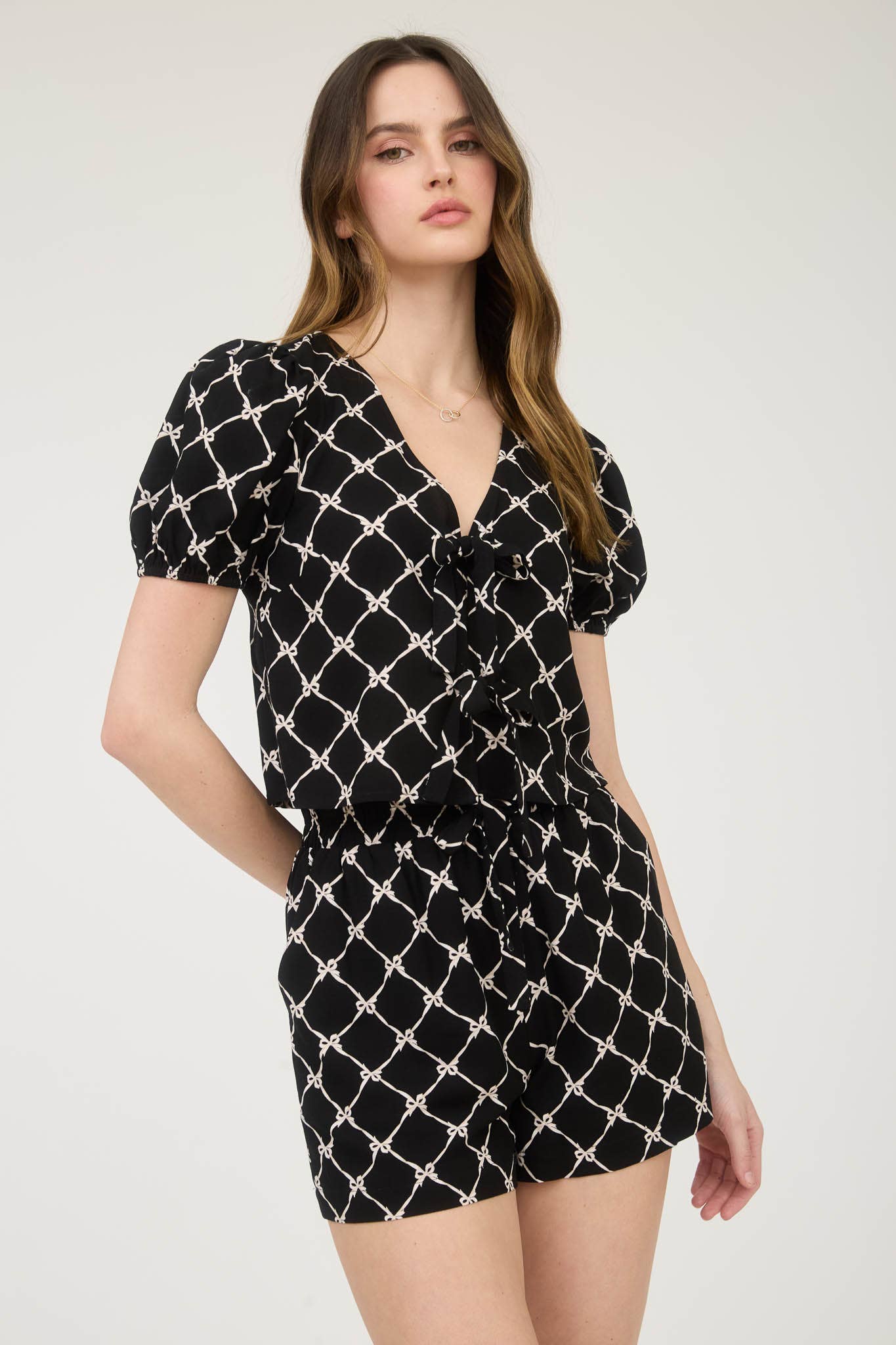 BOW PATTERN FRONT TIE PUFF SLEEVE LINEN BLOUSE